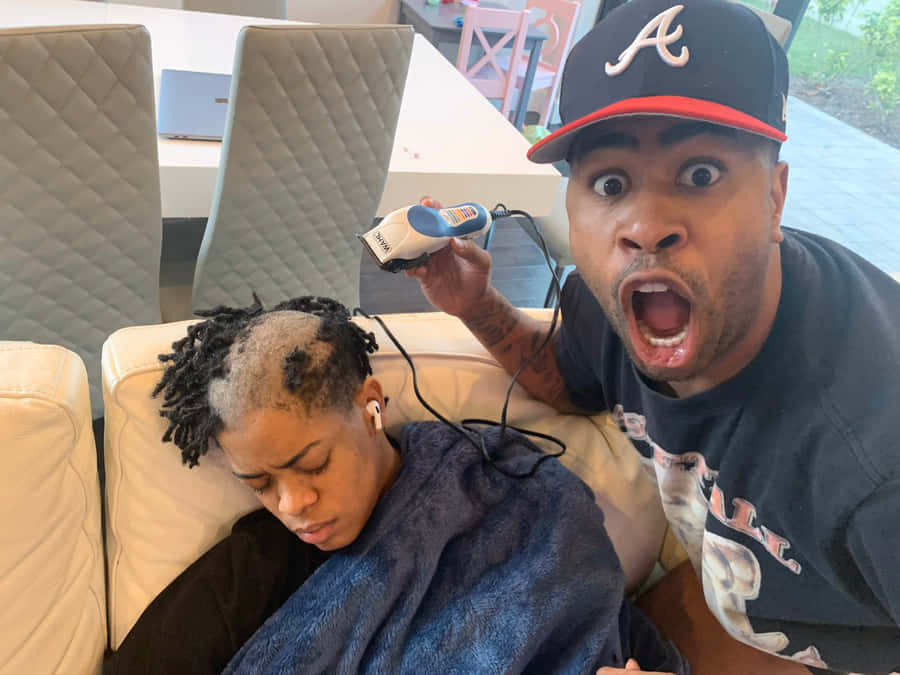 Prettyboyfredo Looking Focused And Stylish Wallpaper