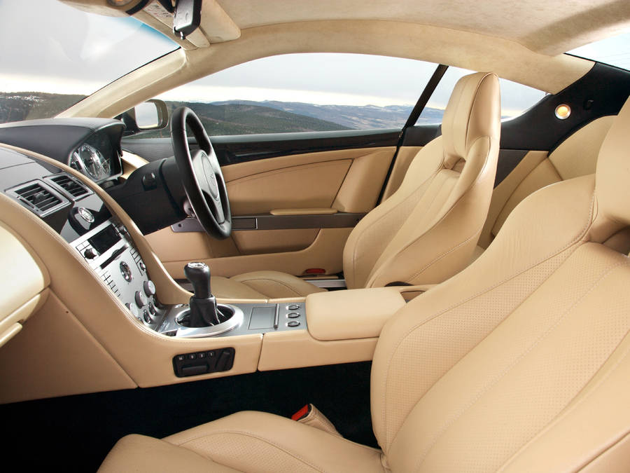 Preview Wallpaper Aston Martin, Db9, 2006, Beige, Interior, Salon Steering Wheel, Speedometer Wallpaper