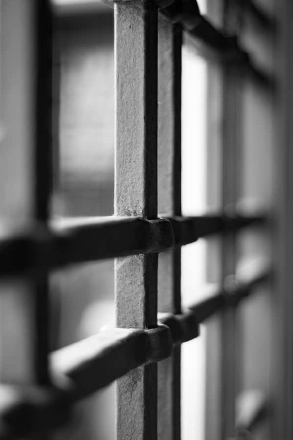 Prison Bars Up Close Wallpaper
