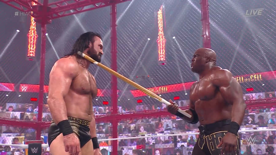 Pro Wrestler Bobby Lashley Challenging Drew Mcintyre Wallpaper