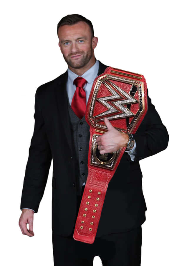 Professional Wrestler With Championship Belt Wallpaper