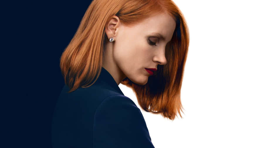 Radiant Jessica Chastain Posing In A Stylish Outfit Wallpaper
