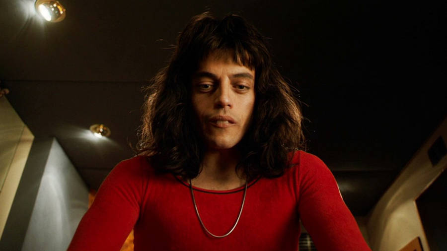 Rami Malek Deep In Thought About His Role Wallpaper