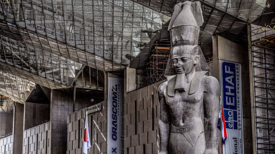 Ramses Ii Red Granite Statue Inside The Grand Egyptian Museum Wallpaper