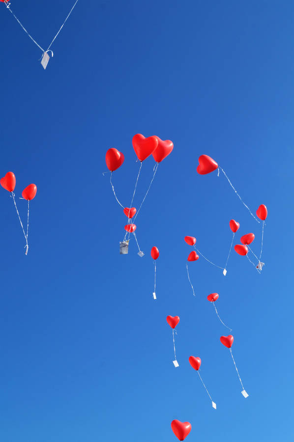 Red Balloons In Sky Wallpaper