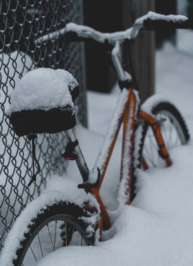 Red Bike Covered In Snow Wallpaper