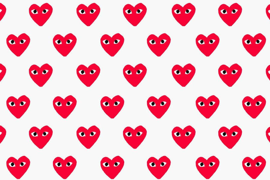 Red Hearts With Eyes On A White Background Wallpaper