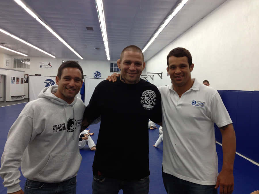 Renato Sobral With Friendsat Gym Wallpaper