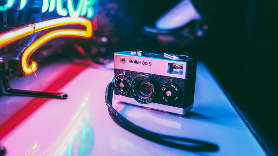 Retro Aesthetic Rollei Film Camera Wallpaper