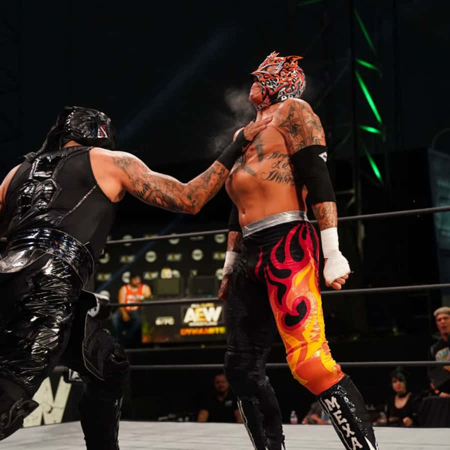 Rey Fenix Fighting Against Penta El Zero M Wallpaper