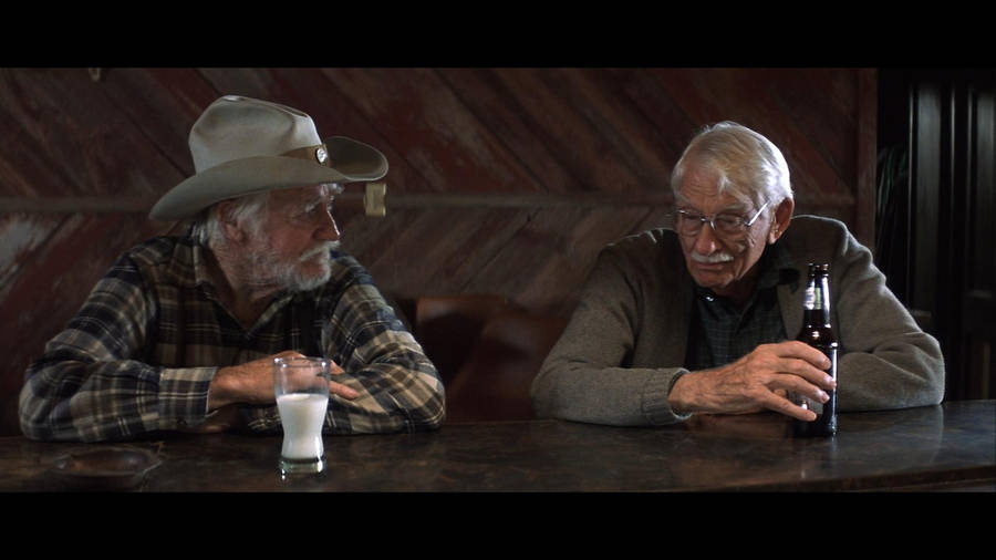 Richard Farnsworth Cowboy Drinking At Bar Wallpaper