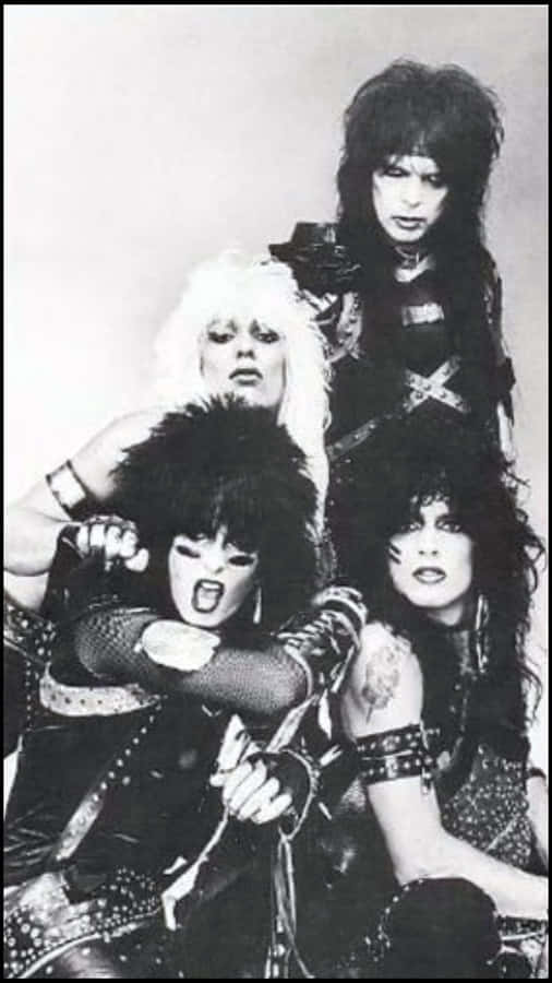 Rocking Out On Stage At Livewire – Motley Crue Wallpaper