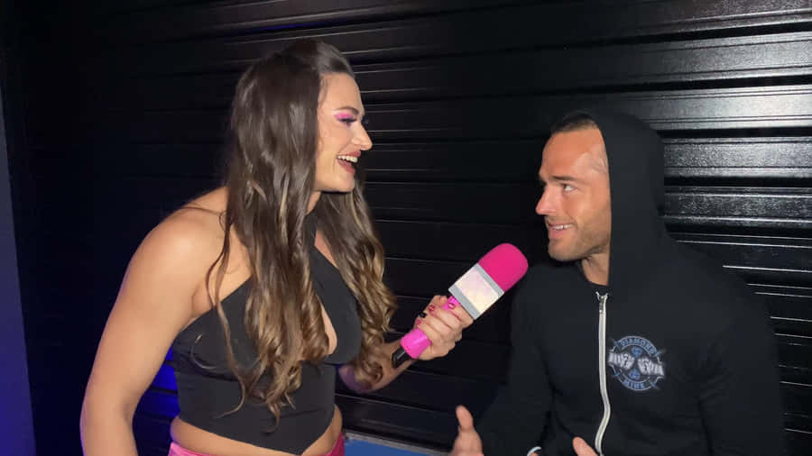 Roderick Strong Being Interviewed By Nina Samuels In 2022 Wallpaper