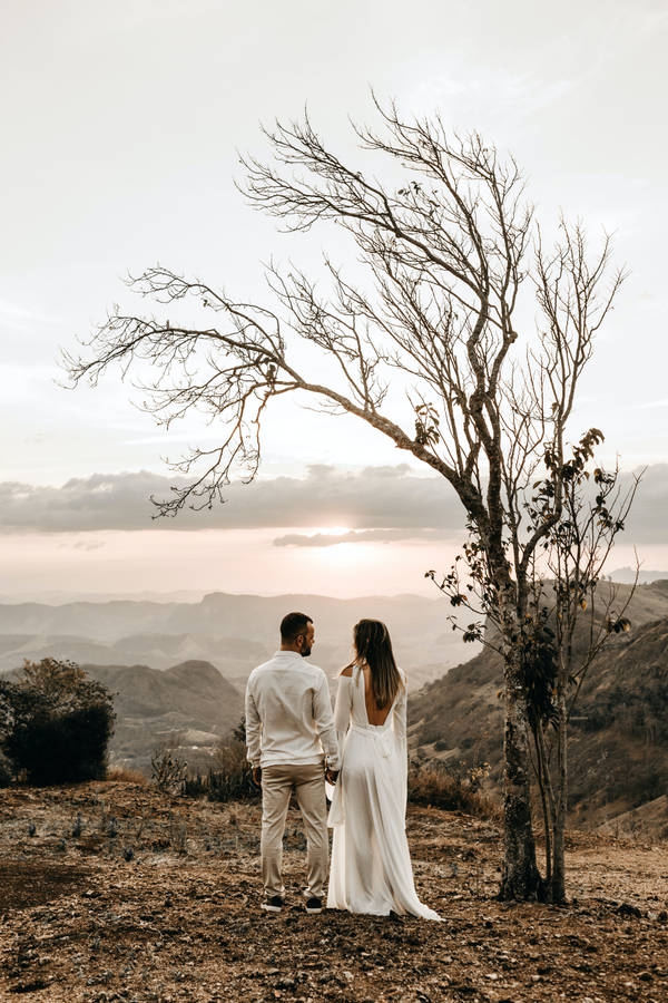 Romantic Couple Prenup On Barren Mountain Wallpaper