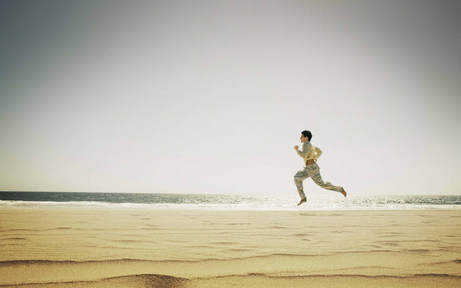 Running Man In Beach Shore Wallpaper