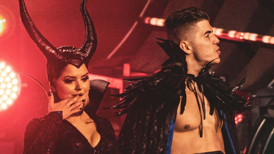 Sammy Guevara And Tay Melo In Costumes Wallpaper