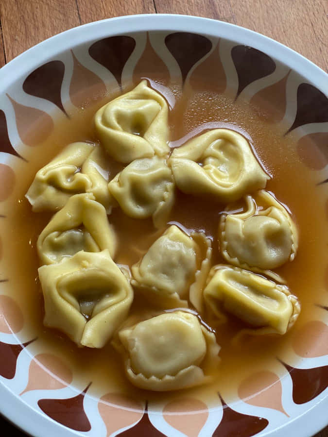 Savory Home-cooked Tortellini In Brodo Wallpaper