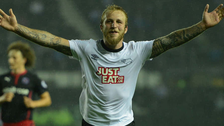 Scottish Professional Football Player Johnny Russell On Field Wallpaper