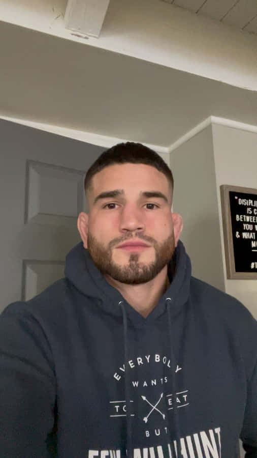 Sean Brady Wearing A Hoodie Wallpaper