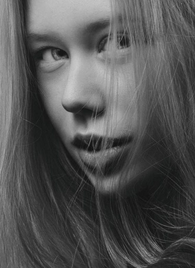 Shy Woman With Long Hair Wallpaper