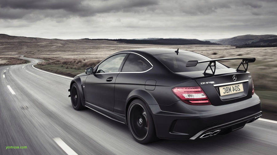 Sleek Mercedes Benz C300 In Urban Elegance Wallpaper