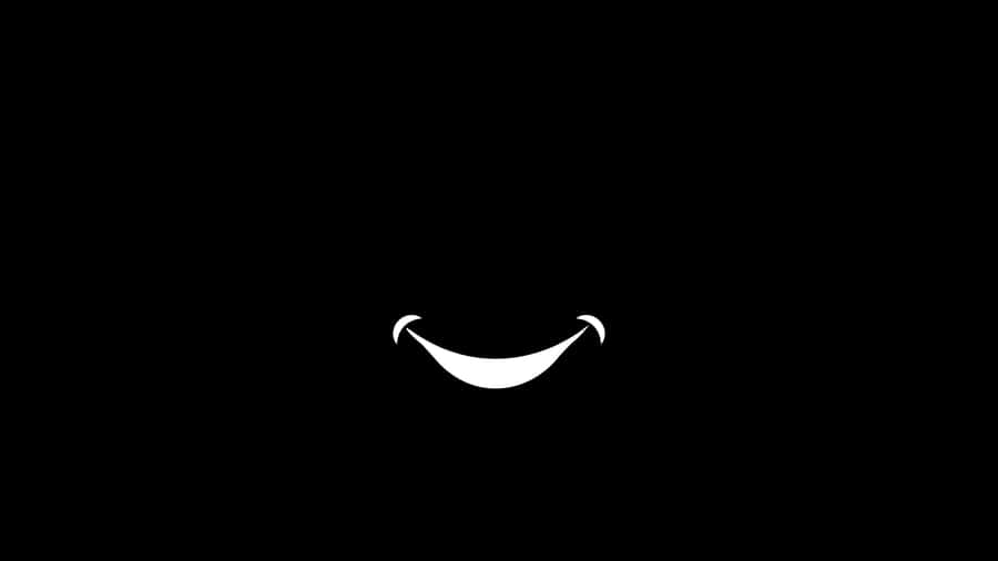 Smile In Black Wallpaper