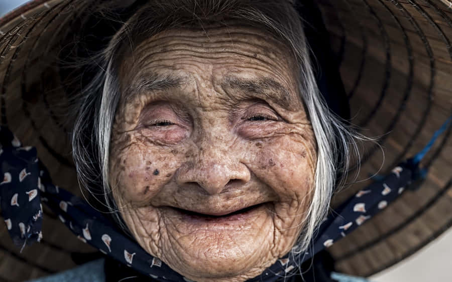 Smiling Asian Old Lady Wallpaper