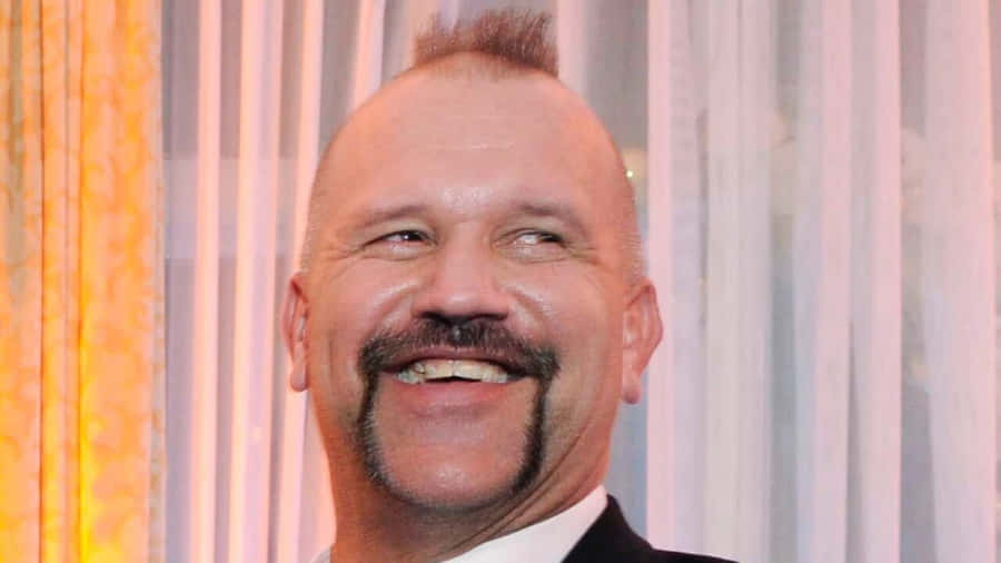 Smiling_ Man_ In_ Tuxedo.jpg Wallpaper