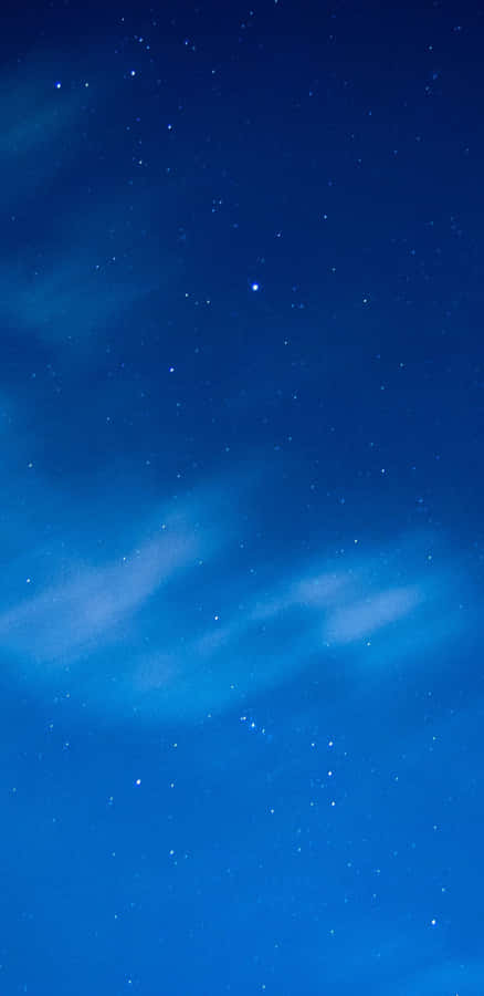 Soar To The Limitless Possibilities Of A Glowing Galaxy Sky Wallpaper