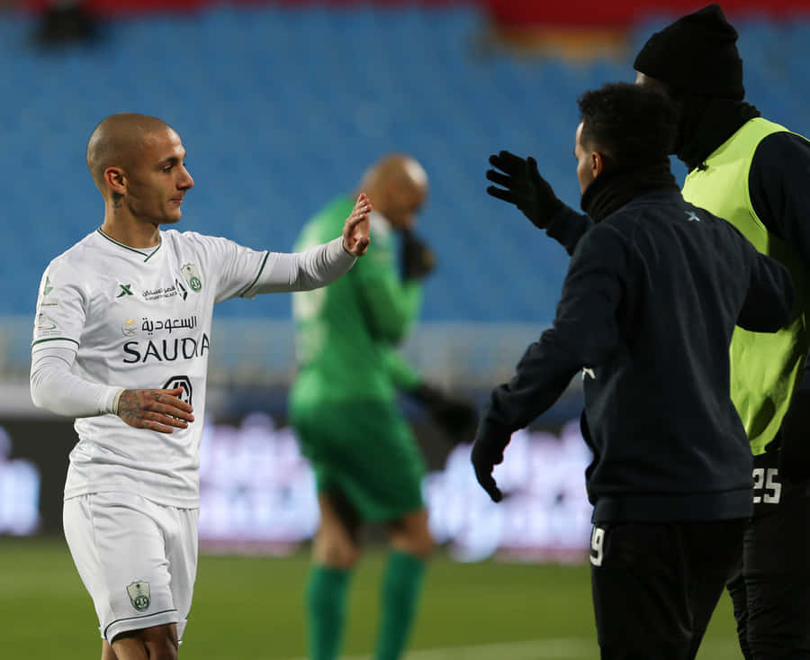 Soccer Player Celebrationwith Team Mate Wallpaper