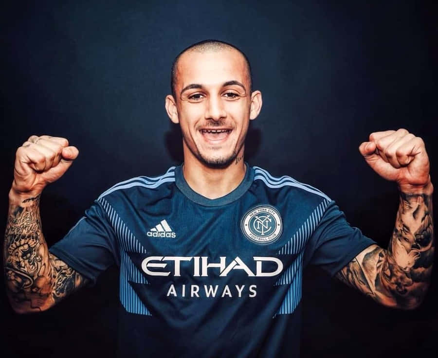 Soccer Player Celebratory Pose Wallpaper