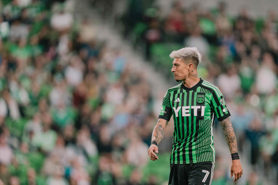 Soccer Player Green Striped Kit Wallpaper