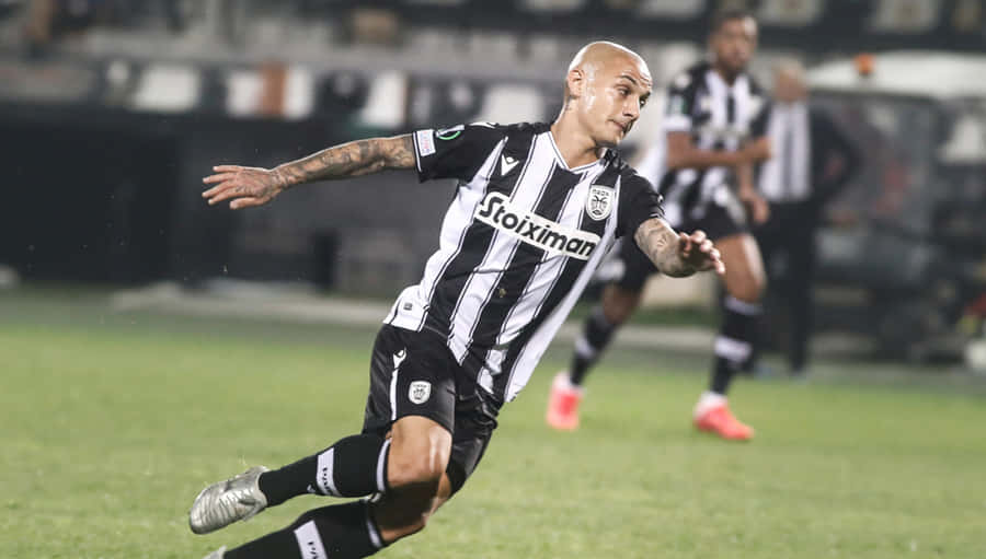 Soccer Player In Action During Match Wallpaper