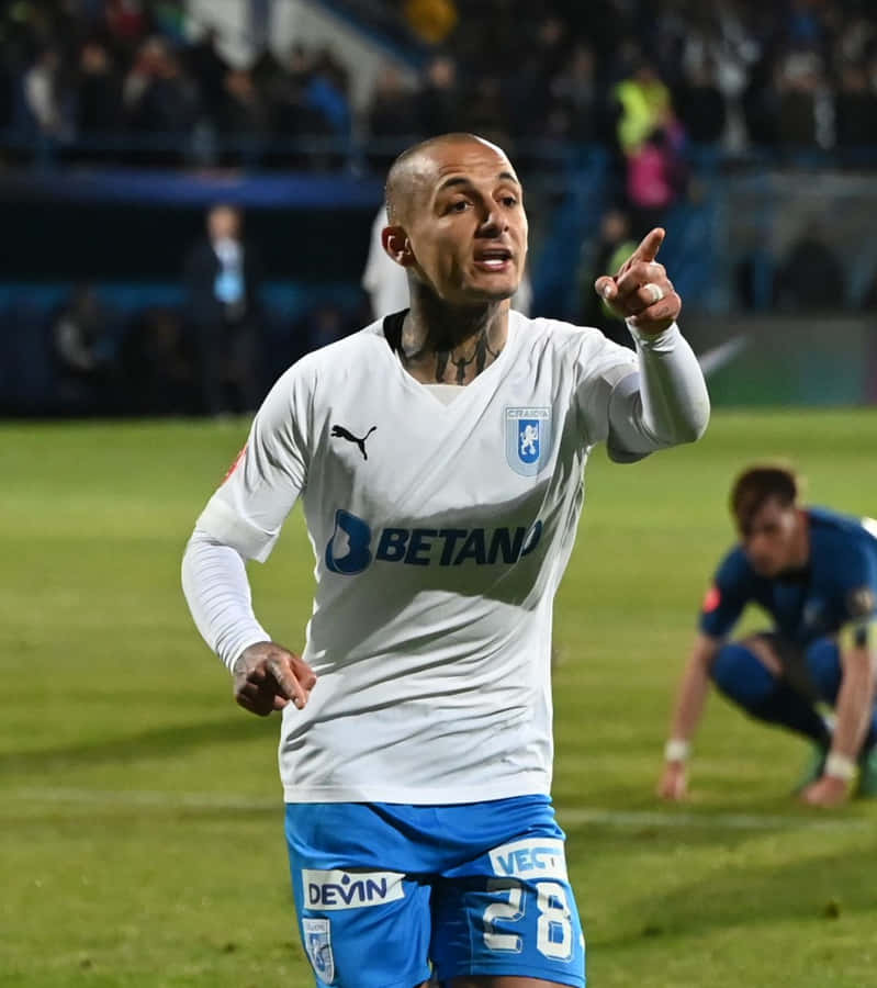 Soccer_ Player_ Pointing_ During_ Match Wallpaper