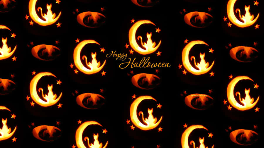 Spooky Halloween Pumpkins Glowing In The Midnight Scenes Wallpaper