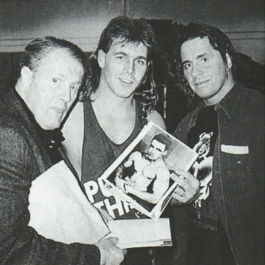 Stu Hartand Sons Holding Photo Wallpaper