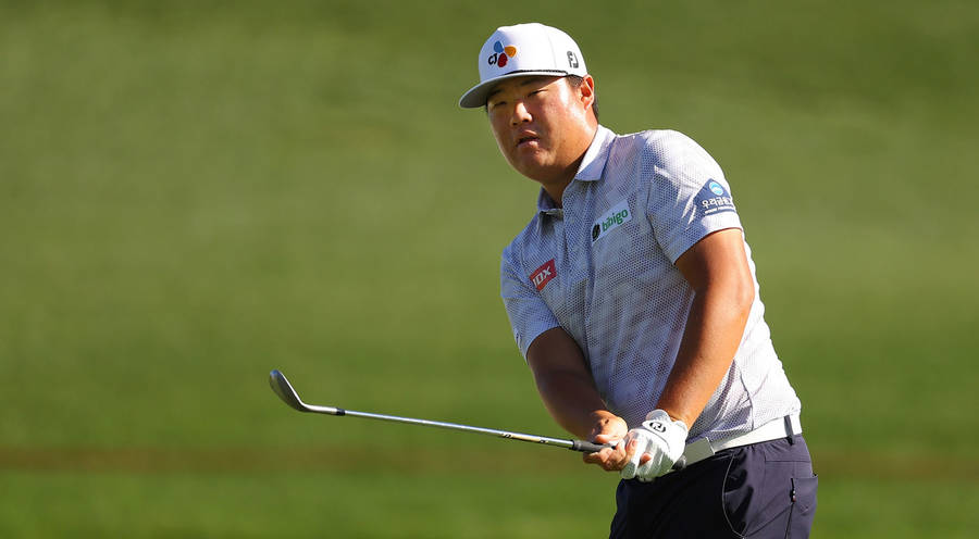 Sungjae Im Holding The Golf Club Wallpaper