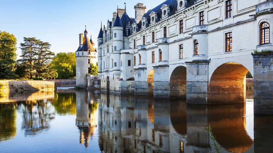 Sunset At The Chenonceau Castle Over The Cher River Wallpaper