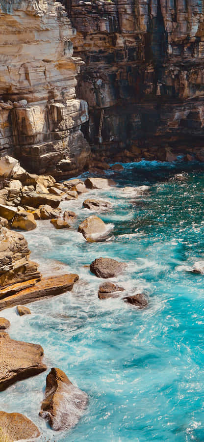 Supercharge Your Device With The Turquoise Iphone. Wallpaper