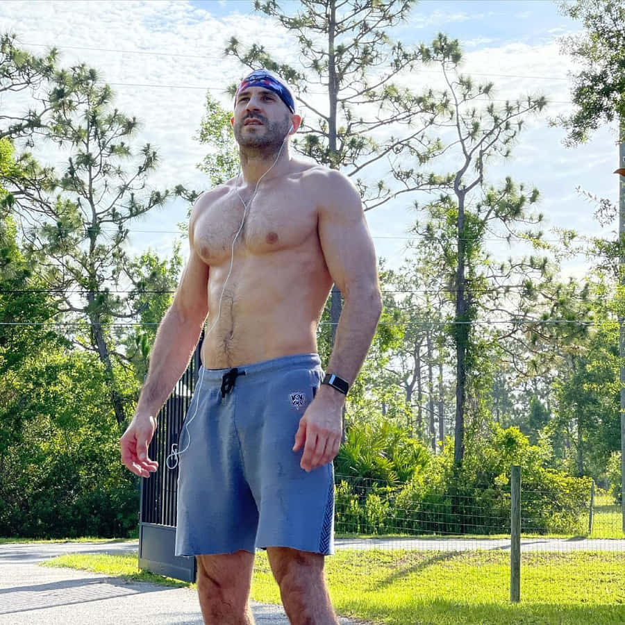 Swiss Professional Wrestler Claudio Castagnoli Morning Run Shot Wallpaper