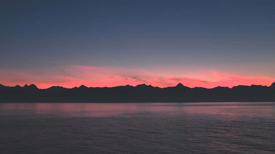 Take Your On-the-go Laptop To The Beach For Some Summer Vibes! Wallpaper