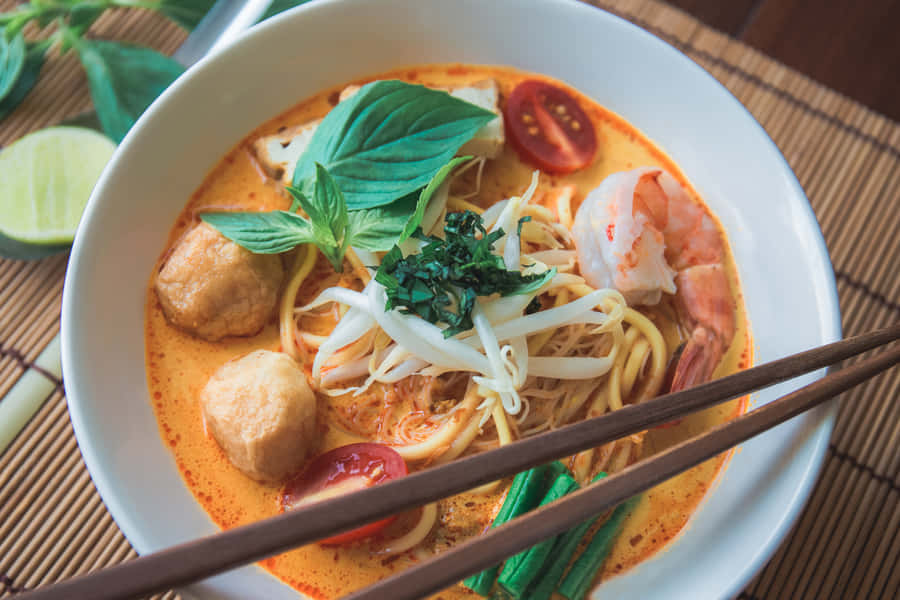 Tempting Bowl Of Curry Laksa Wallpaper