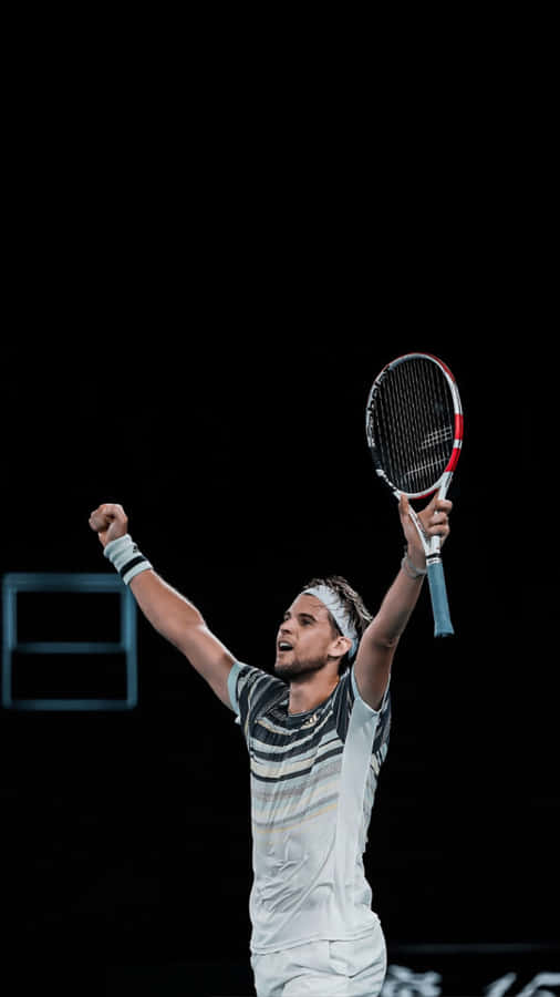 Tennis Player Celebrating Victory Wallpaper