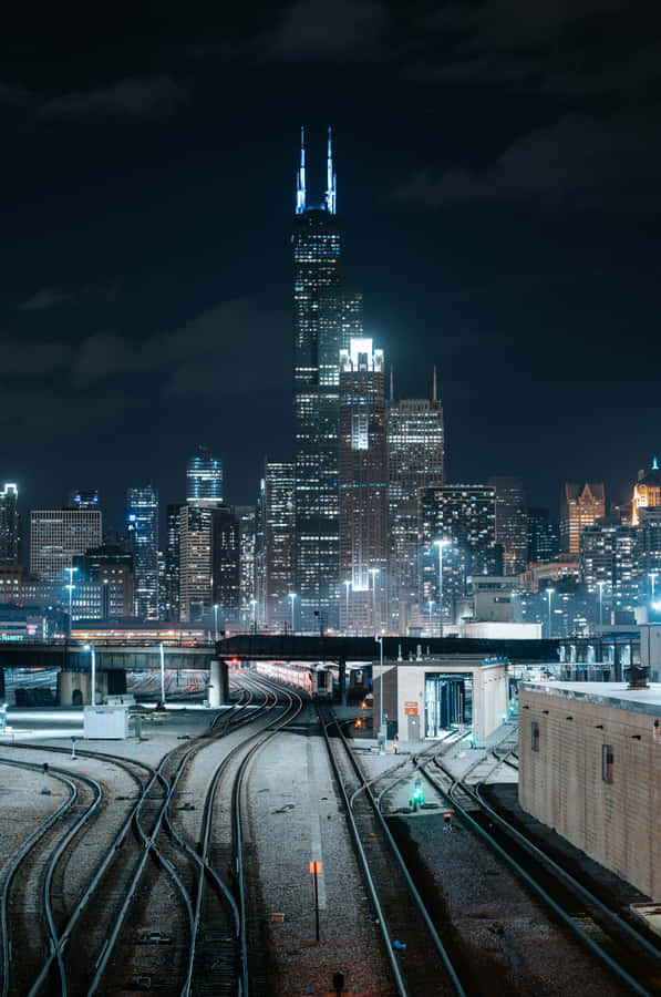 The Amazing Chicago Skyline At Night Wallpaper