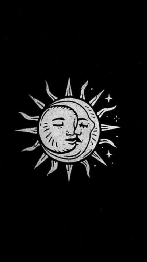 The Celestial Dance Of The Sun And Moon Wallpaper