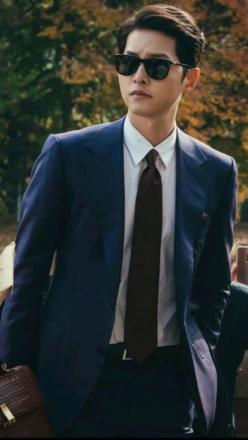 The Charming Song Joong-ki On A Deep Dark Background. Wallpaper