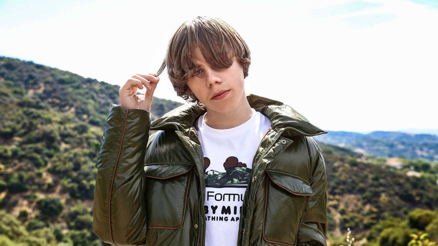 The Kid Laroi At Mountains Wallpaper