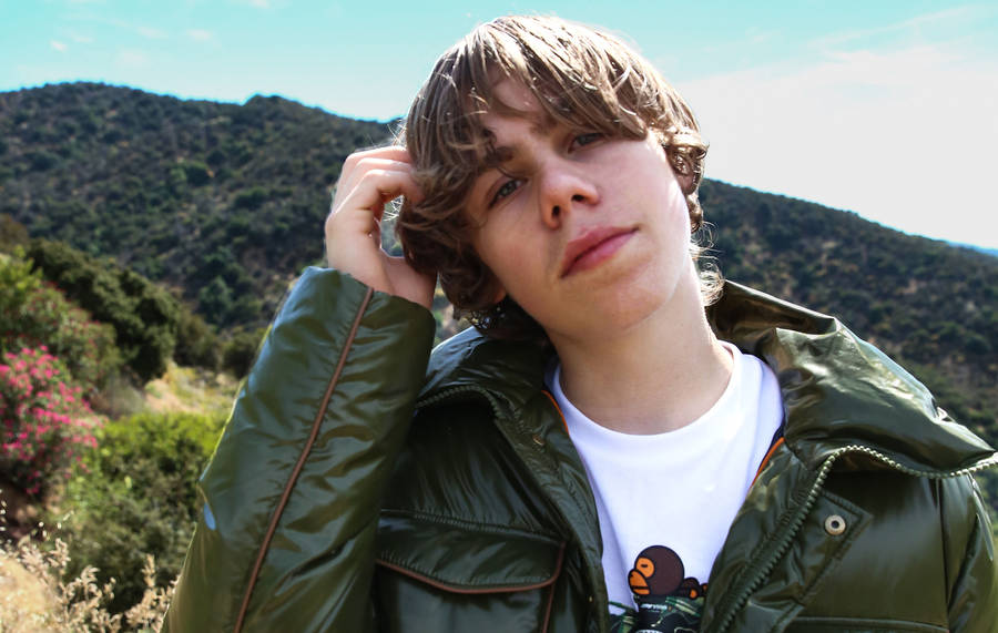 The Kid Laroi Green Jacket Outfit Wallpaper