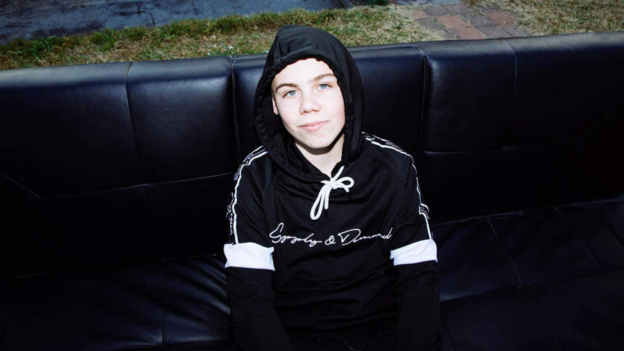 The Kid Laroi In Couch Shot Wallpaper