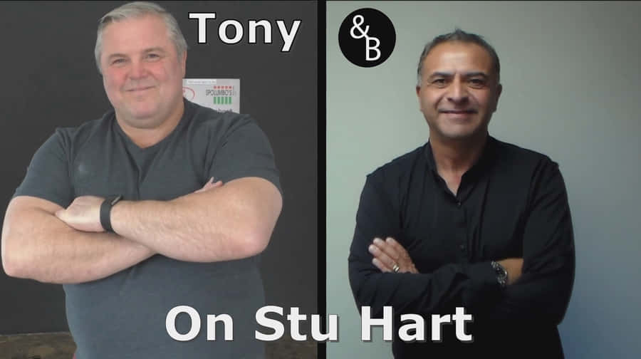 The Legendary Stu Hart Posing In His Wrestling Gym Wallpaper